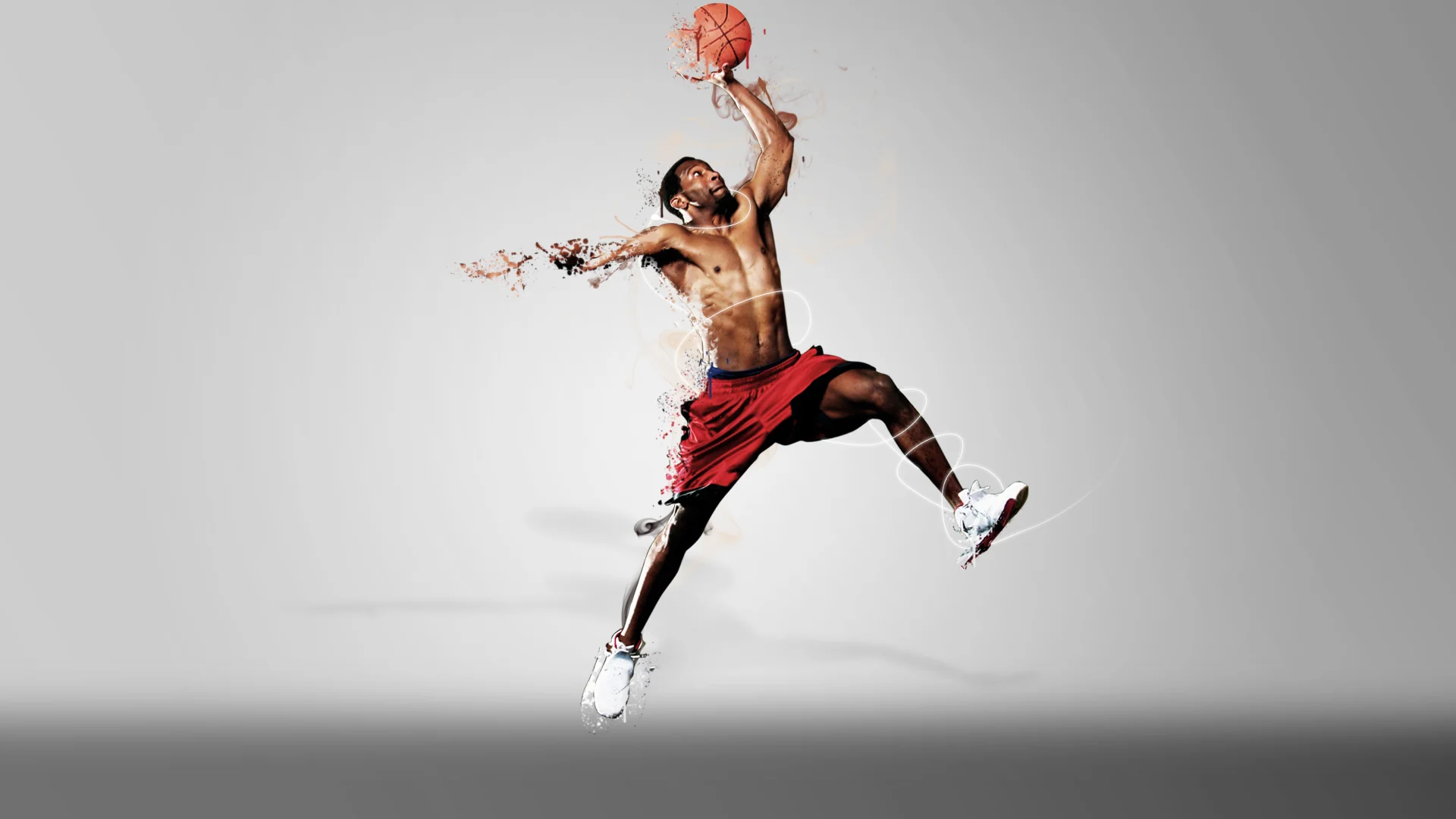 A man prepares to dunk a basketball
